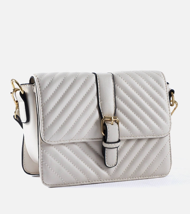 Kremowa pikowana listonoszka