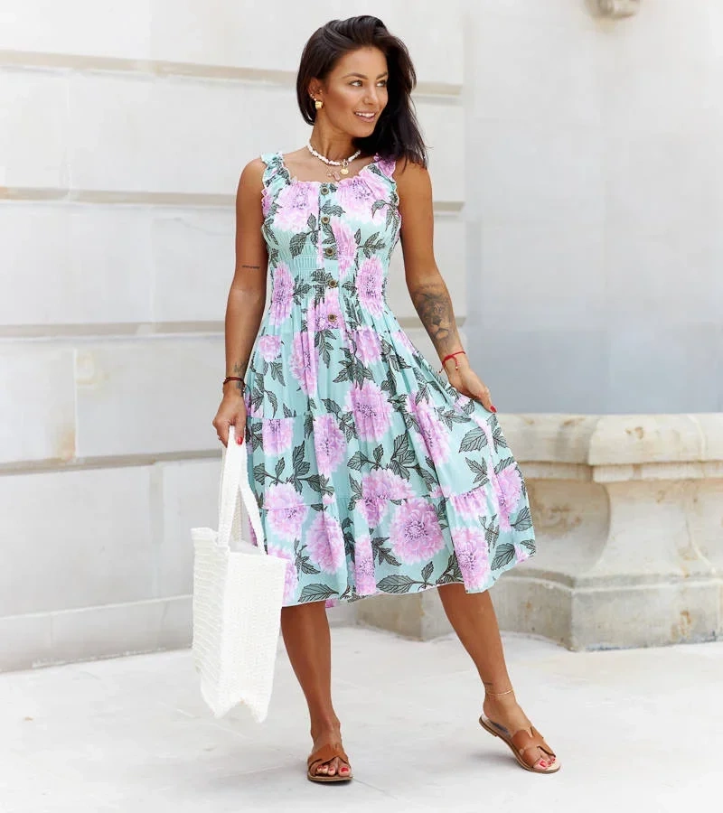 Zielona sukienka w fioletowe kwiaty