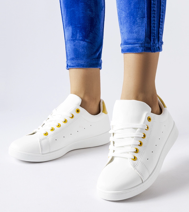 Białe tenisówki z zółtą wstawką