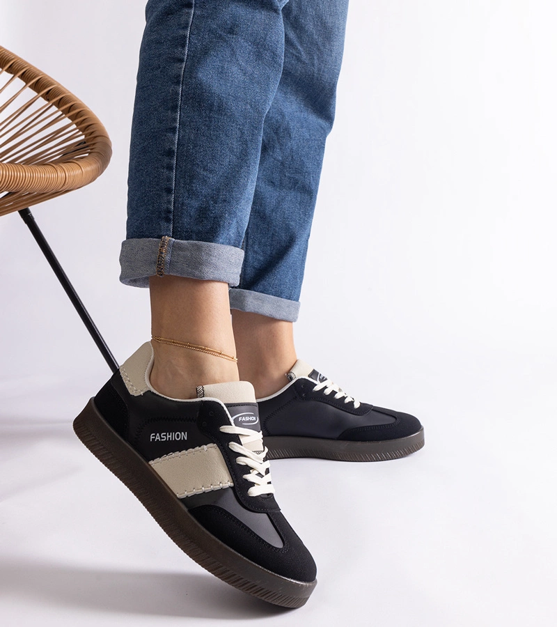 Czarne sneakersy na platformie z przeszyciami