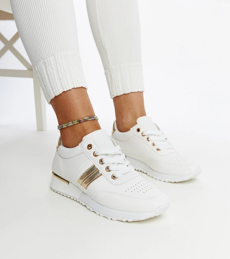 Biało-złote sneakersy na gumowej platformie