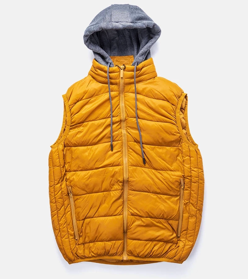 Żółta pikowana kamizelka z dresowym kapturem