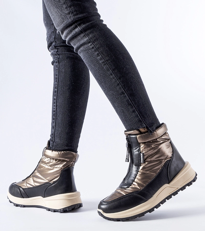 Brązowe ocieplane śniegowce na zamek