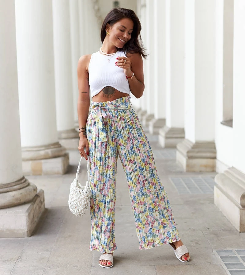 Żółte wzorzyste spodnie plisowane