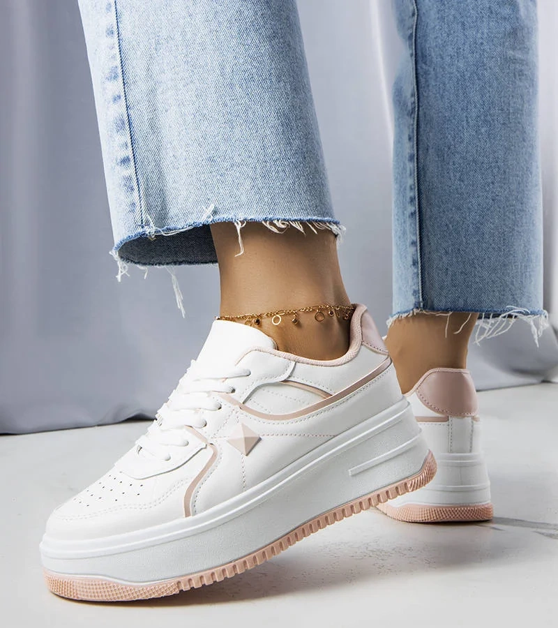 Biało-różowe sneakersy ozdobione perforacją