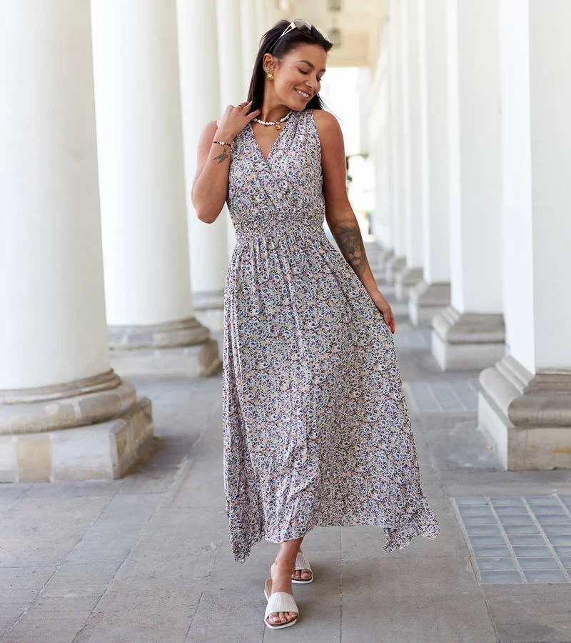 Żółta sukienka midi w kwiaty