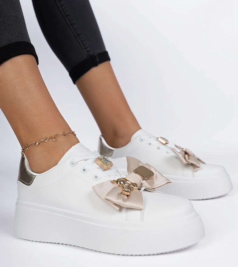 Hers Biało-złote sneakersy damskie zdobione kokardką i złotym misiem