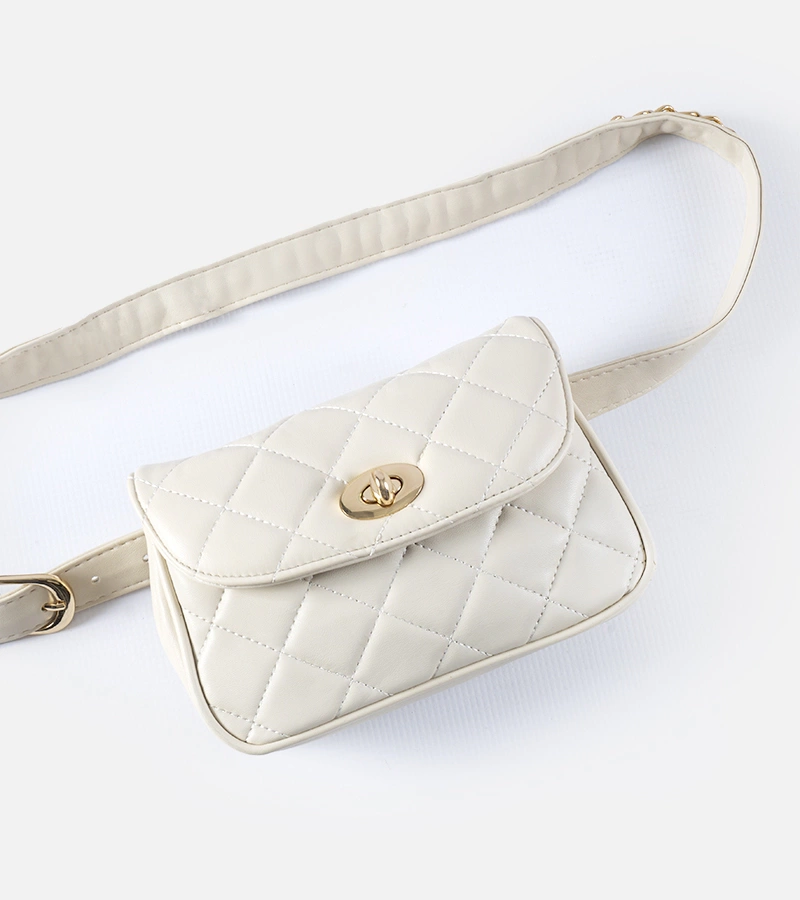 Beżowa pikowana saszetka